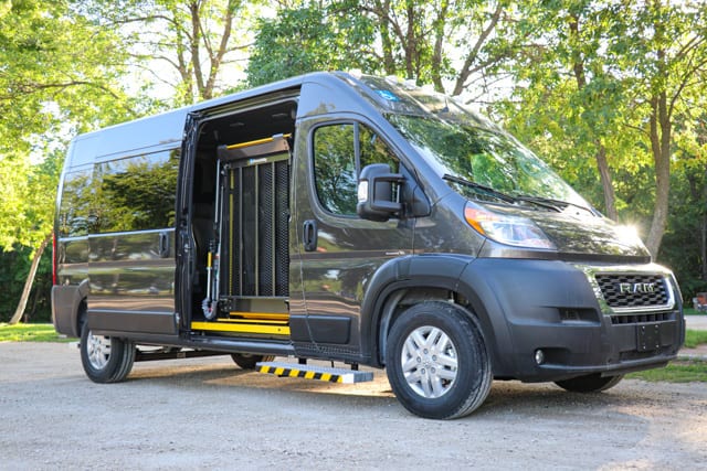 Ram Promaster with heavy duty BraunAbility wheelchair lift on the side and removable passenger seats