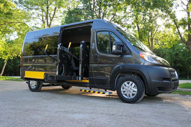 Grey Dodge Ram Promaster van with BraunAbility hydraulic lift for wheelchair access