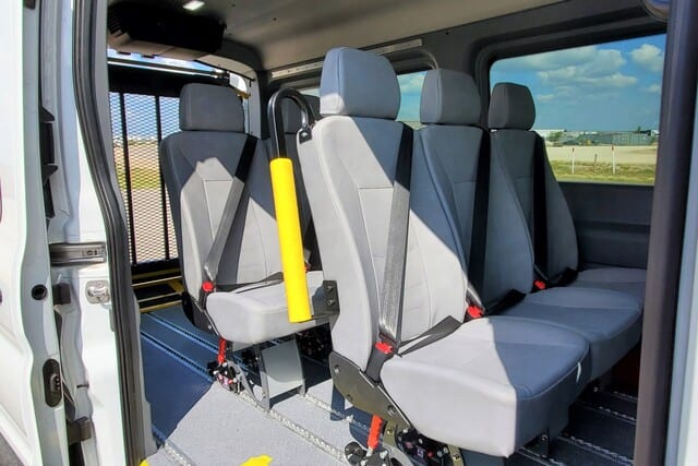 removeable AMF Bruns seats inside MoveMobility wheelchair accessible Ford Transit van