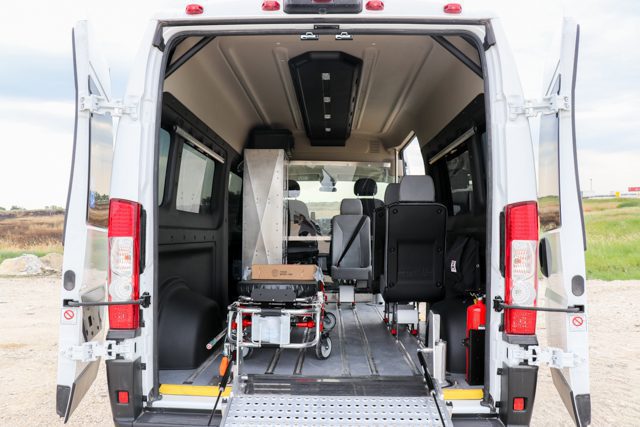 non emergency van with ramp, stretcher, attendant seat, and medical storage cabinet