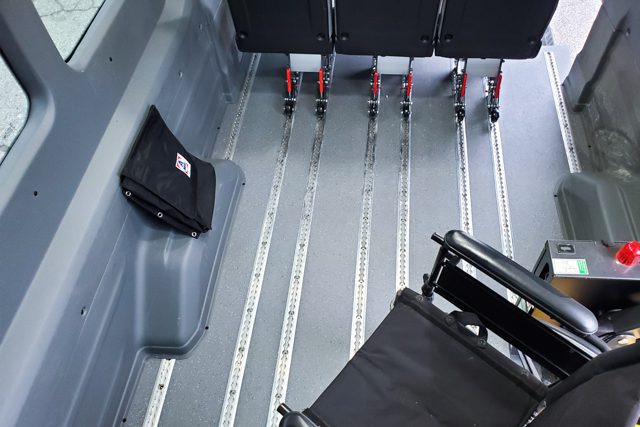 Overhead view showing wheelchair and seat space inside Ford Transit T6 mobility van