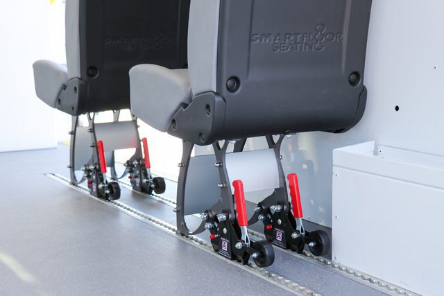 Removable passenger/attendant seats with AutoFloor